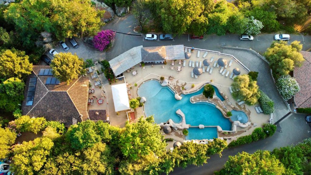 an aerial view of a mansion with a swimming pool at Camping Les Oliviers in Porto Ota