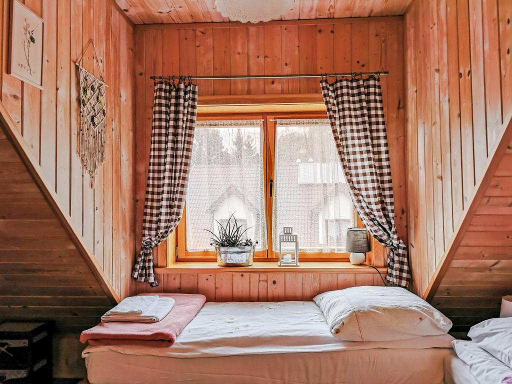 Postel nebo postele na pokoji v ubytování Jasminowe Wzgorze