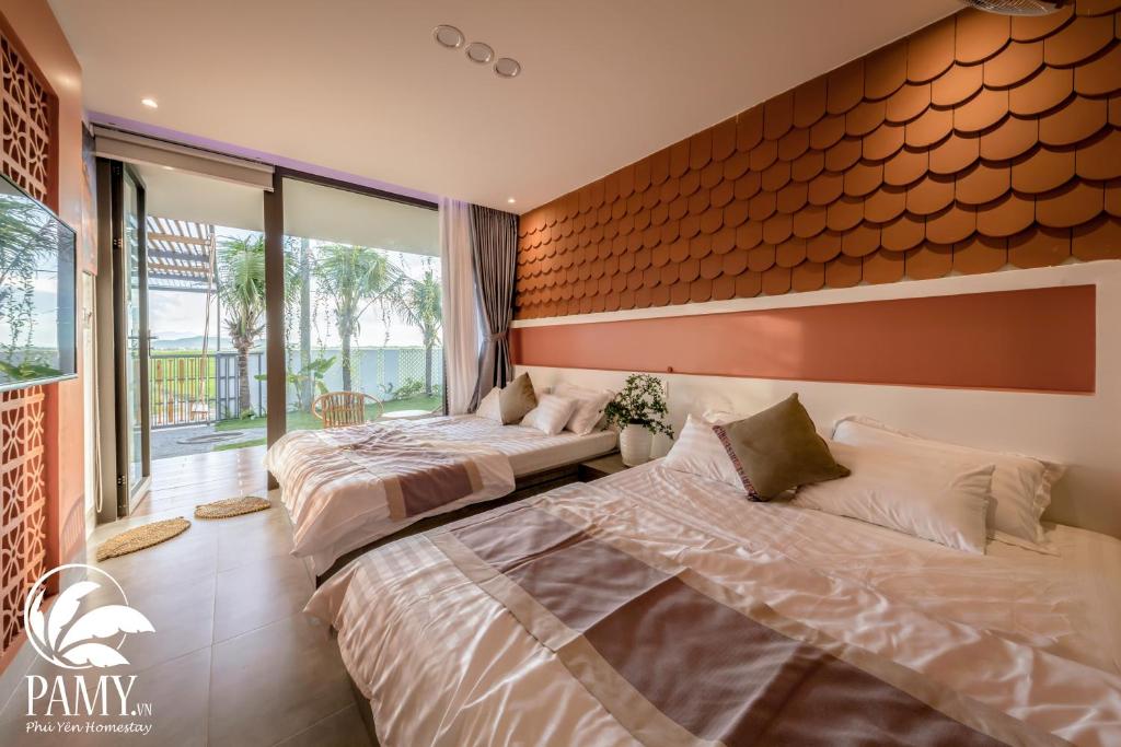 Giường trong phòng chung tại PAMY Homestay Phú Yên