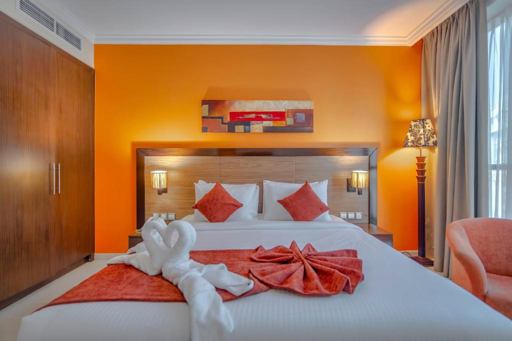 Postel nebo postele na pokoji v ubytování Icon Delux Hotel Apartments Al Barsha - Formerly Abidos