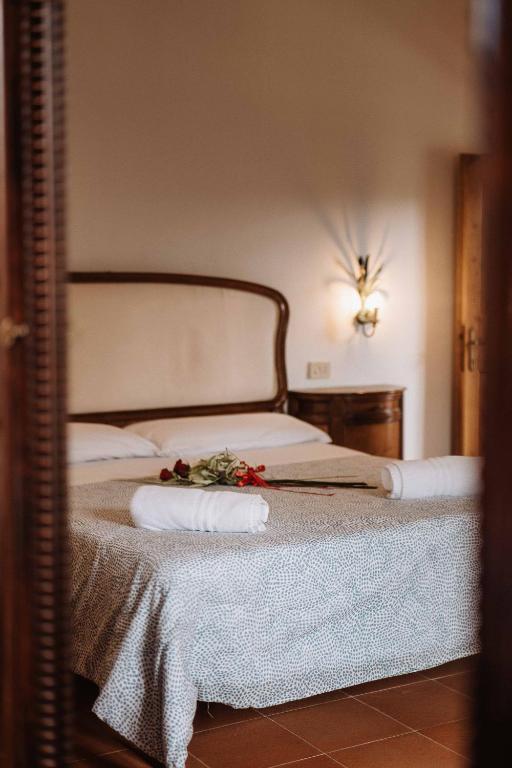 Łóżko lub łóżka w pokoju w obiekcie Casalchino-Fattoria La Torre