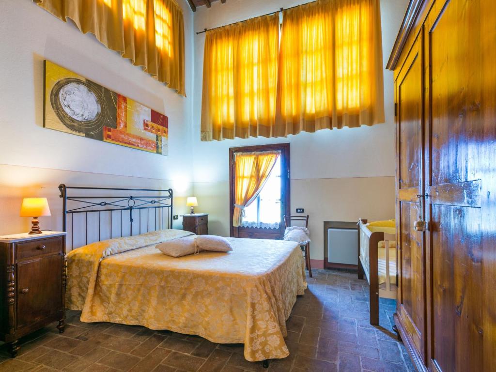 A bed or beds in a room at Holiday Home Casa Mori by Interhome