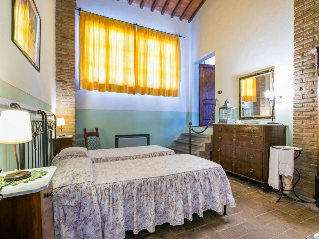 A bed or beds in a room at Holiday Home Casa Mori by Interhome