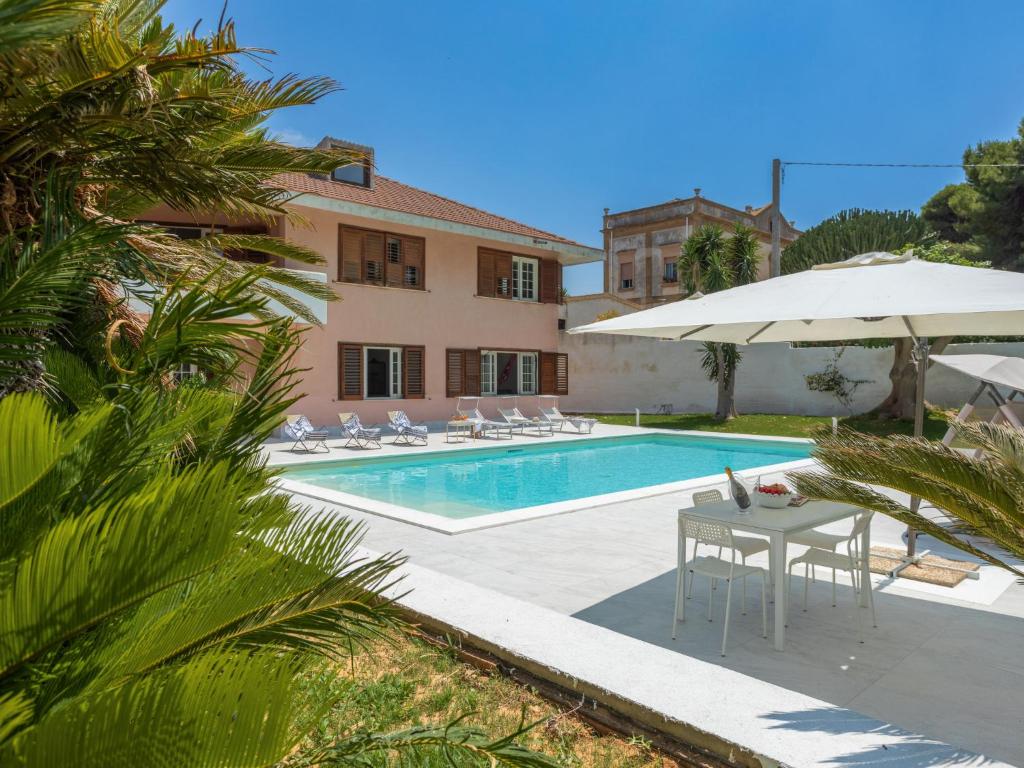 The swimming pool at or close to Holiday Home Sammartano by Interhome
