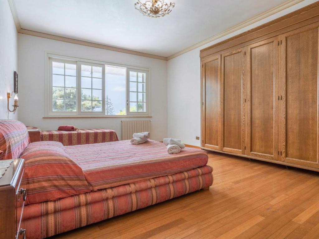A bed or beds in a room at Holiday Home Sammartano by Interhome