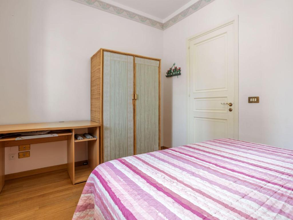 A bed or beds in a room at Holiday Home Sammartano by Interhome