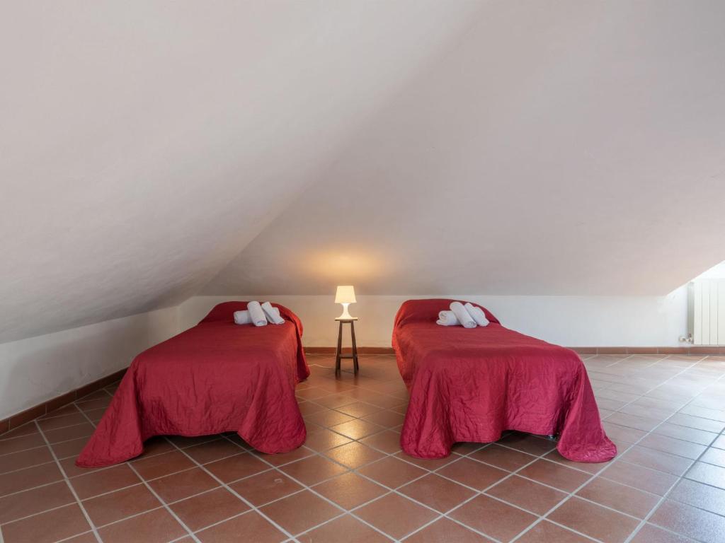 A bed or beds in a room at Holiday Home Sammartano by Interhome