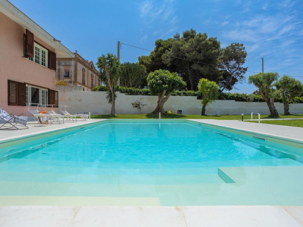 The swimming pool at or close to Holiday Home Sammartano by Interhome