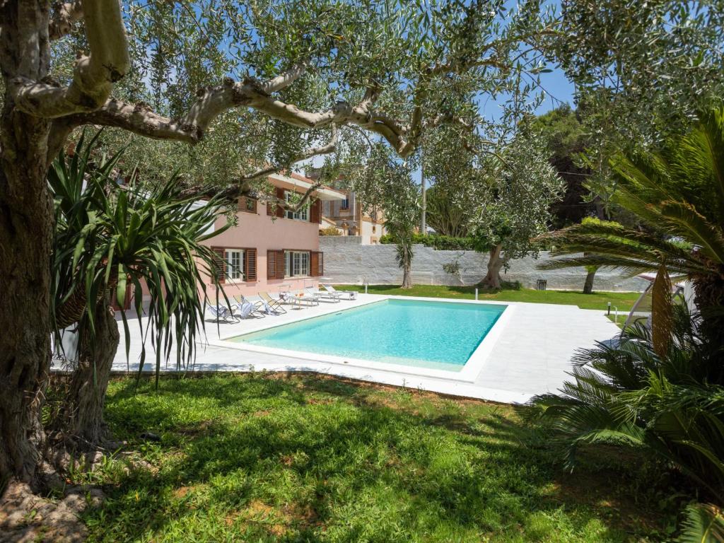 The swimming pool at or close to Holiday Home Sammartano by Interhome