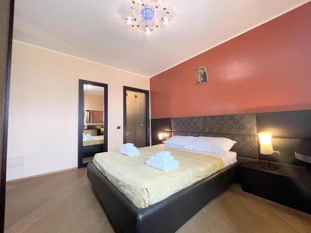 Voodi või voodid majutusasutuse Accomodo RHP18 Pentavano Fiera toas