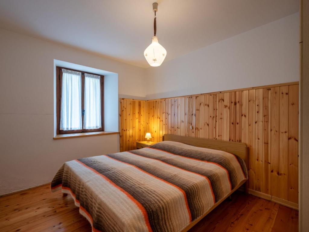 Łóżko lub łóżka w pokoju w obiekcie Apartment Vetan by Interhome
