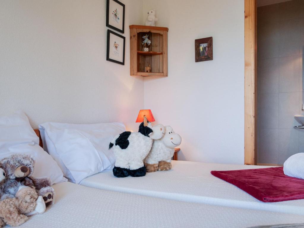 Postel nebo postele na pokoji v ubytování Chalet Chalet Arvine by Interhome