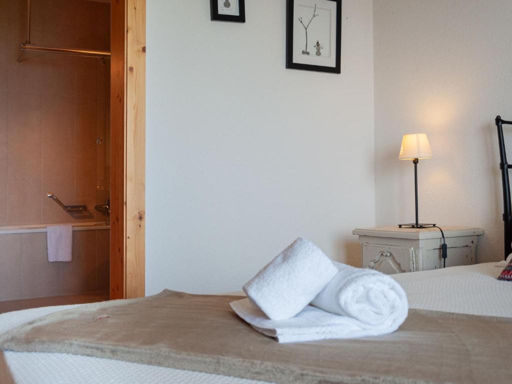Postel nebo postele na pokoji v ubytování Chalet Chalet Arvine by Interhome