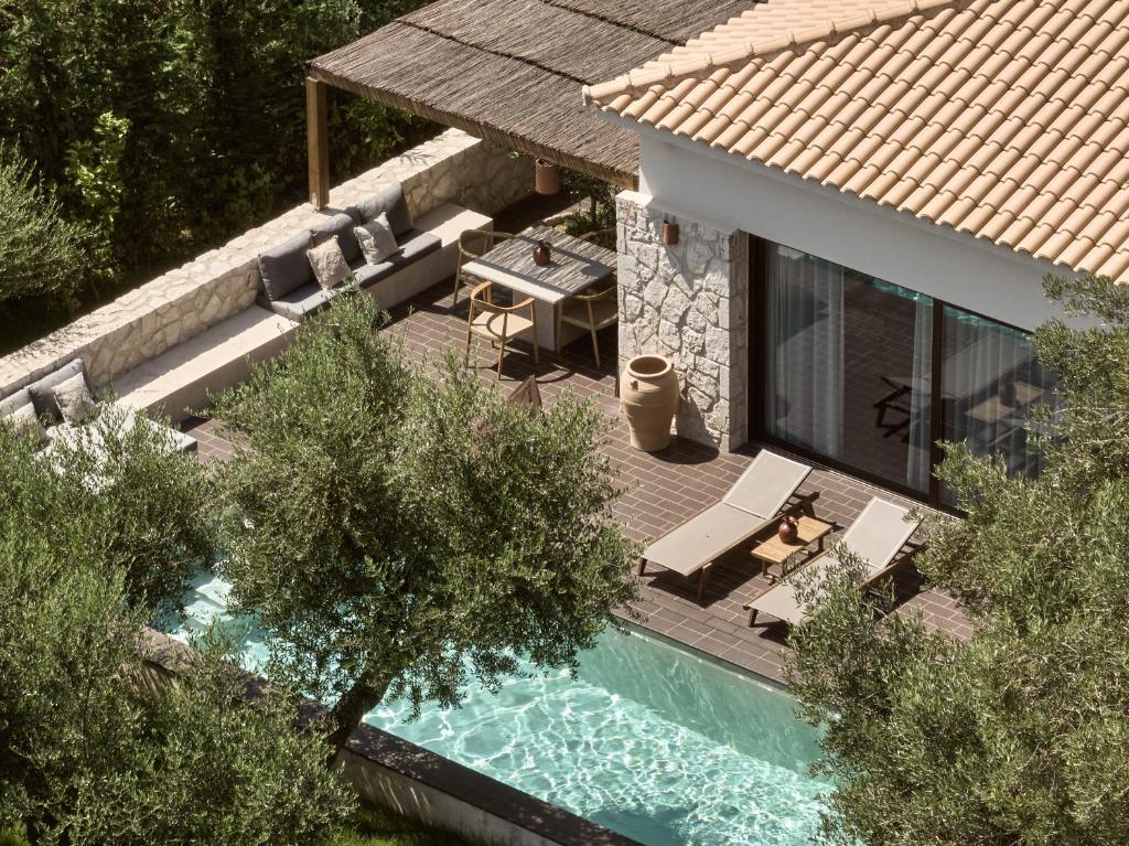 an overhead view of a house with a swimming pool at Zayn Luxury Villas, a Serene Escape, By ThinkVilla in Zakynthos Town