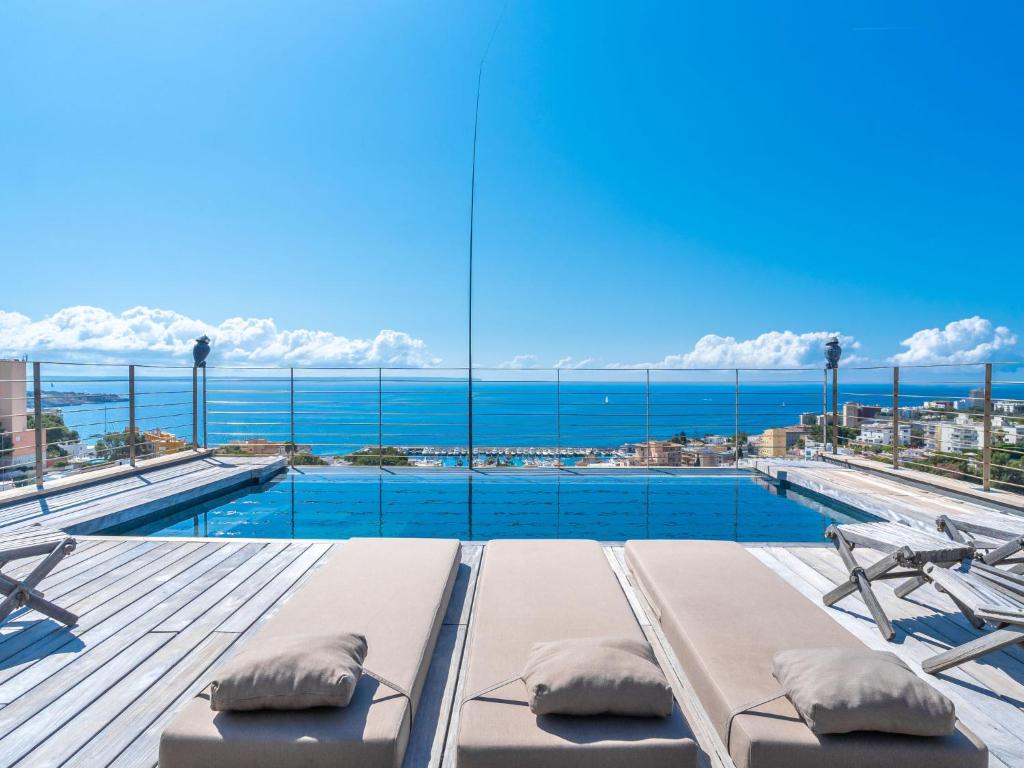 a swimming pool with a view of the ocean at Villa Vistamar by Interhome in Palma de Mallorca