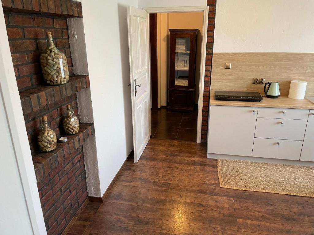 Kuchyň nebo kuchyňský kout v ubytování Apartamenty Dorotowo