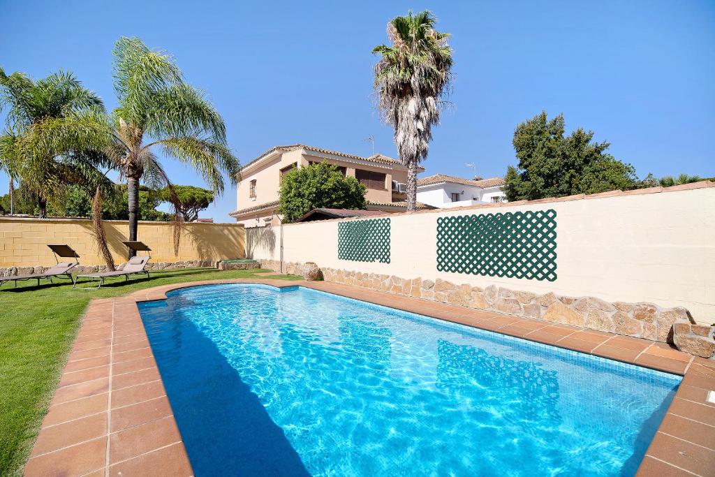 Chalet con piscina en la Barrosa,