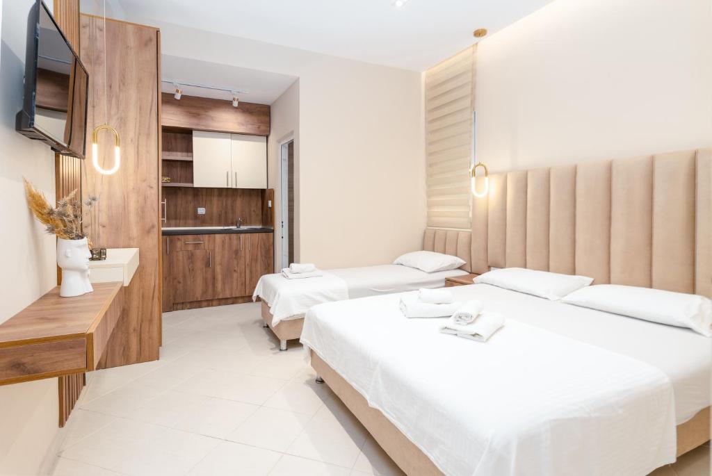 Postel nebo postele na pokoji v ubytování Apartments Ada Bojana