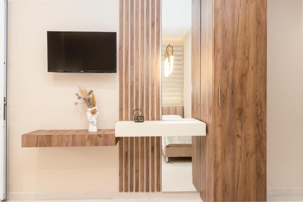 TV a/nebo společenská místnost v ubytování Apartments Ada Bojana