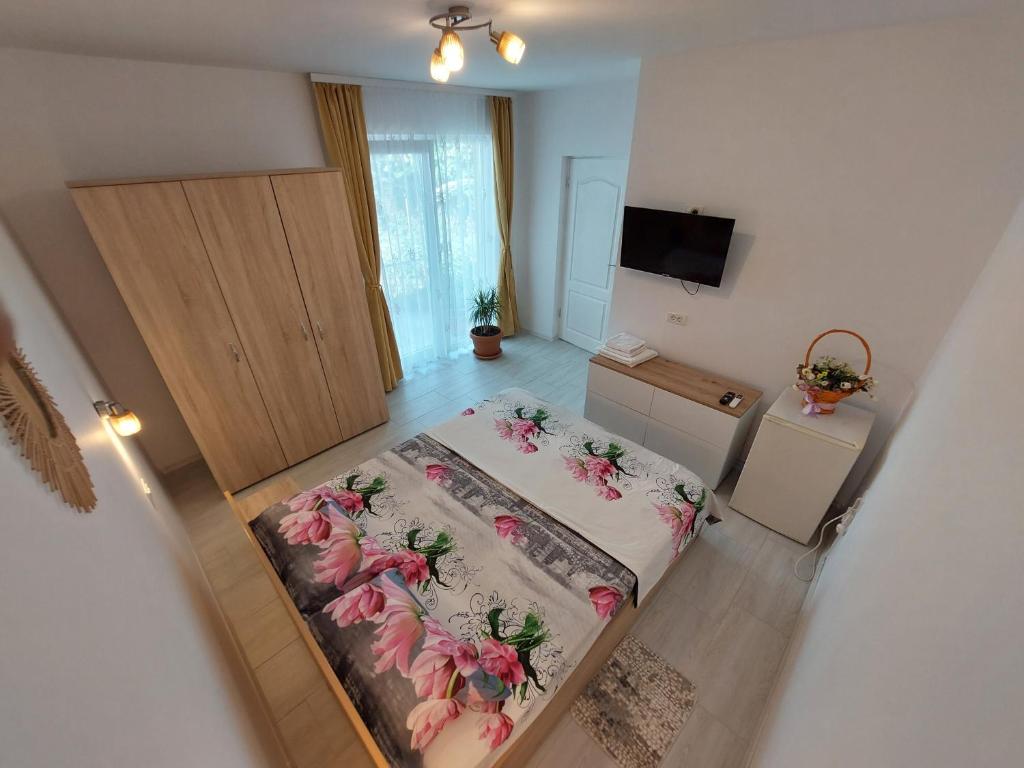 Postel nebo postele na pokoji v ubytování Casa AnaMaria