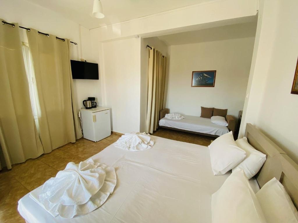 Postel nebo postele na pokoji v ubytování Central Hotel