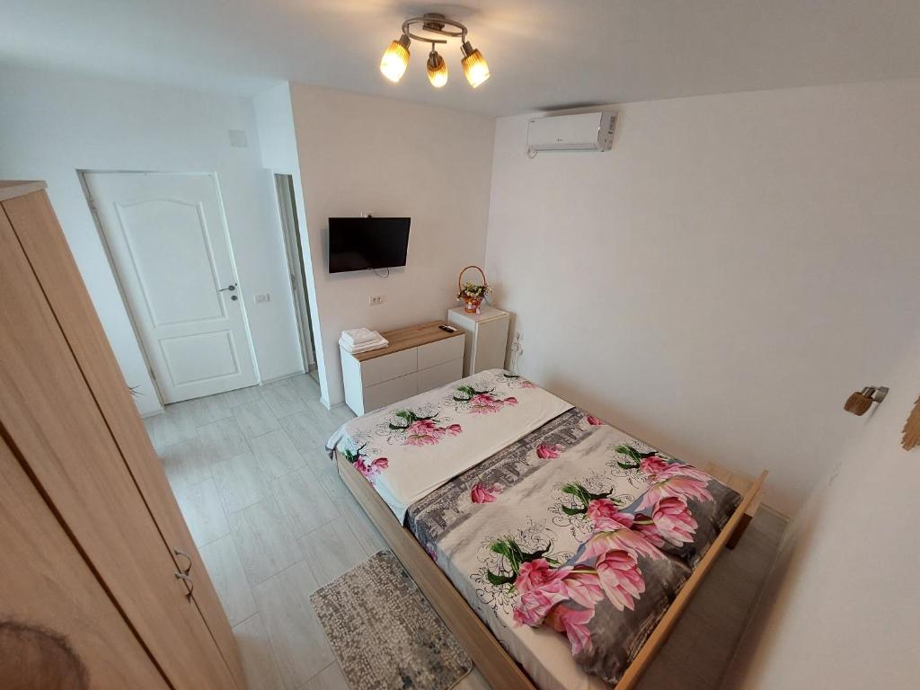 Postel nebo postele na pokoji v ubytování Casa AnaMaria