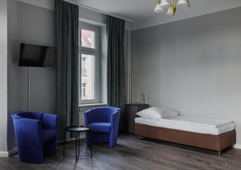 Postel nebo postele na pokoji v ubytování Hotel Nova