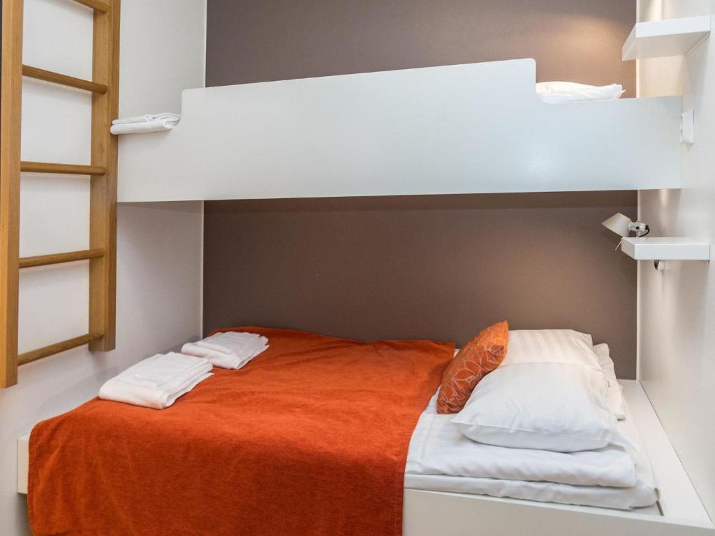 Postel nebo postele na pokoji v ubytování Holiday Home Ruka ski chalets 46- 1207 by Interhome