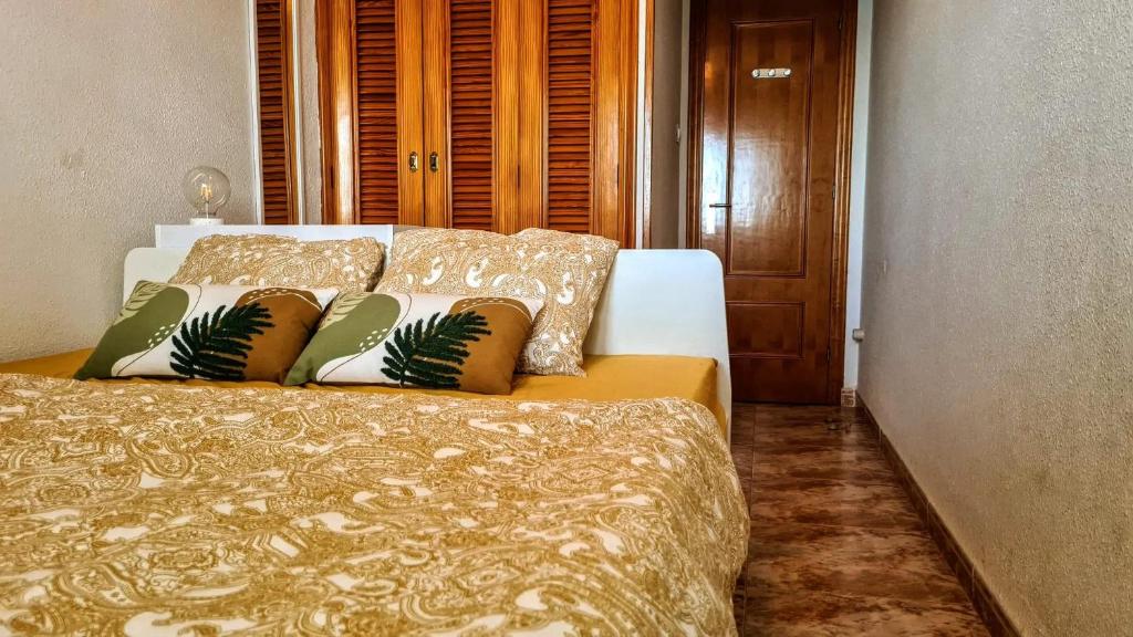 Posteľ alebo postele v izbe v ubytovaní Apartmán pri mori