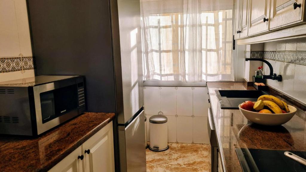 Kuchyňa alebo kuchynka v ubytovaní Apartmán pri mori