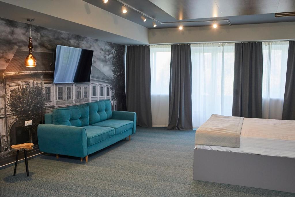 Postel nebo postele na pokoji v ubytování Hotel Bistrita