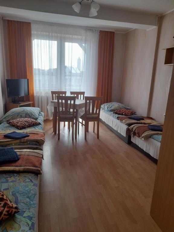 Postel nebo postele na pokoji v ubytování Ośrodek wczasowy Ewa