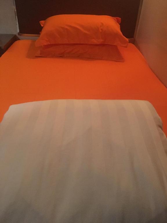 Postel nebo postele na pokoji v ubytování C U Again Hostel