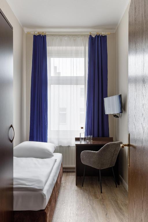 Postel nebo postele na pokoji v ubytování Hotel Nova