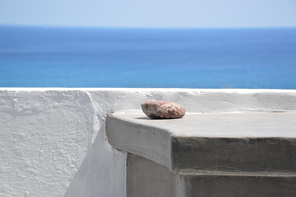 a rock sitting on the side of a wall at Summer Residence in Provatas