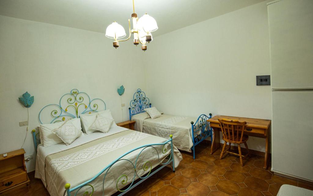 Letto o letti in una camera di Turismo Rurale CUDACCIOLU