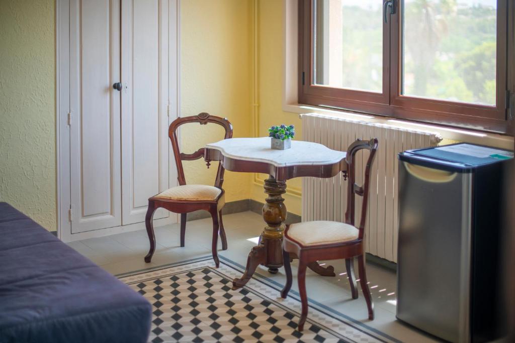 Posedenie v ubytovaní Habitaciones Villa Marcia Solo Adulto