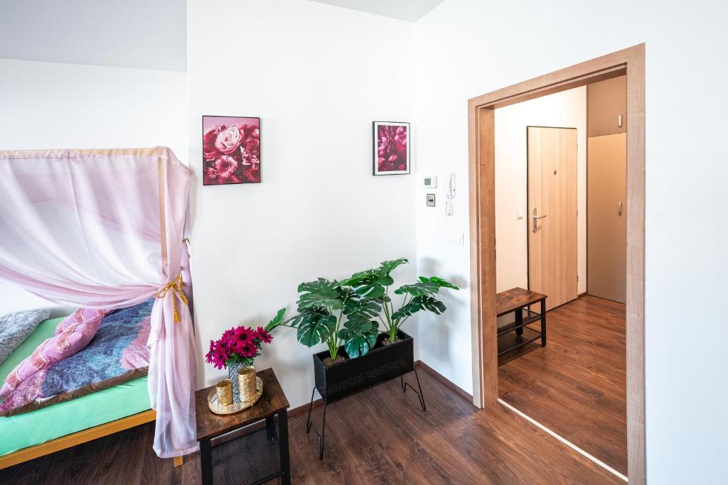 Postel nebo postele na pokoji v ubytování GLAM apartmán Bučovice