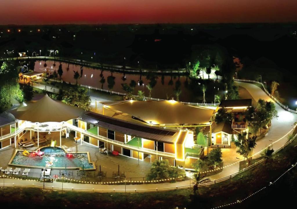 an aerial view of a hotel at night at Hi Creek Resort 