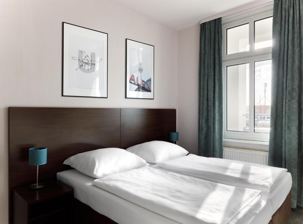 Postel nebo postele na pokoji v ubytování Hotel Nova