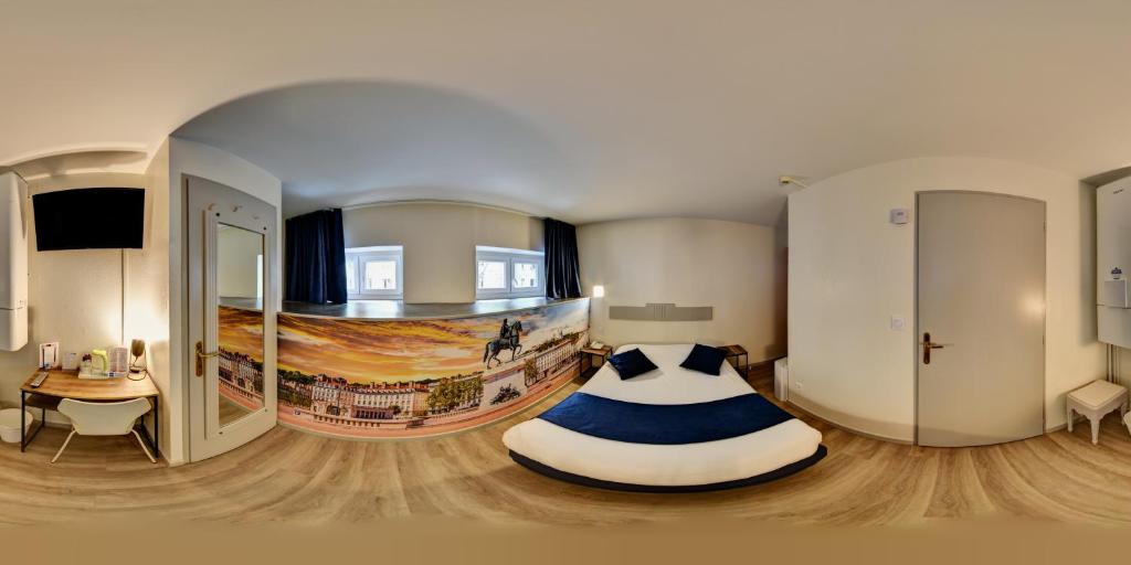 Postel nebo postele na pokoji v ubytování Hôtel du Parc