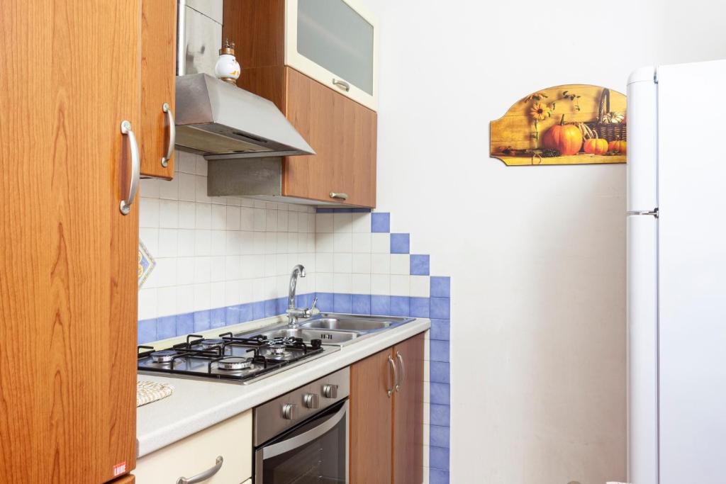 Kuchyň nebo kuchyňský kout v ubytování Acquamarina di Mancaversa