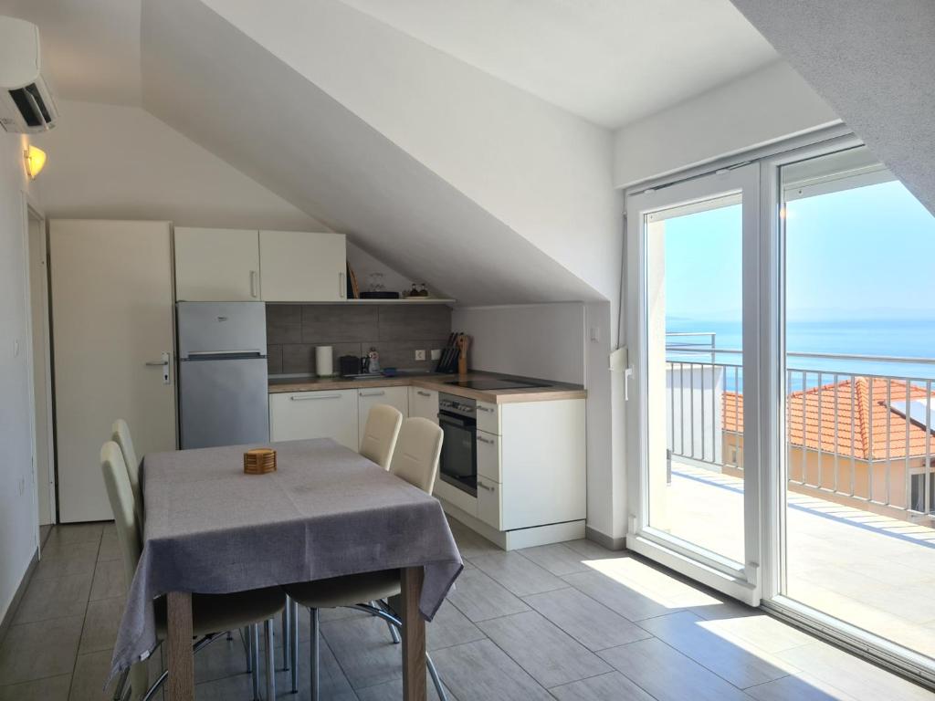 Kuchyň nebo kuchyňský kout v ubytování Apartments Toro
