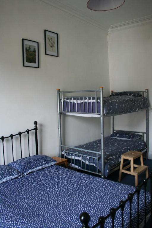 Postel nebo postele na pokoji v ubytování Argyle Backpackers