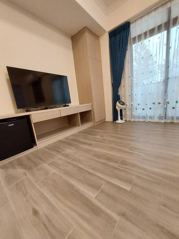 TV a/nebo společenská místnost v ubytování Miss Travel Homestay