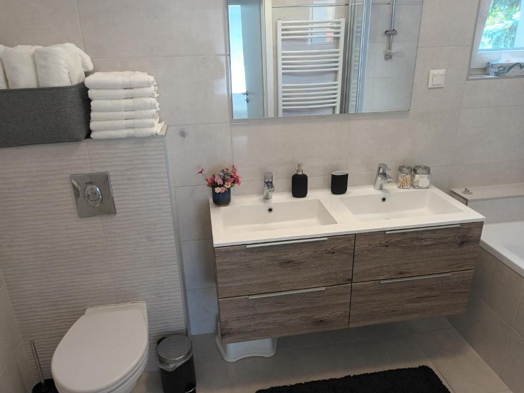 Koupelna v ubytování HANDLER Apartman Sopron