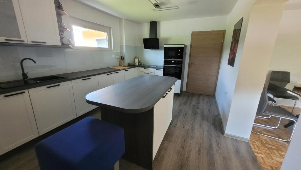Kuchyň nebo kuchyňský kout v ubytování Orange house Šempeter