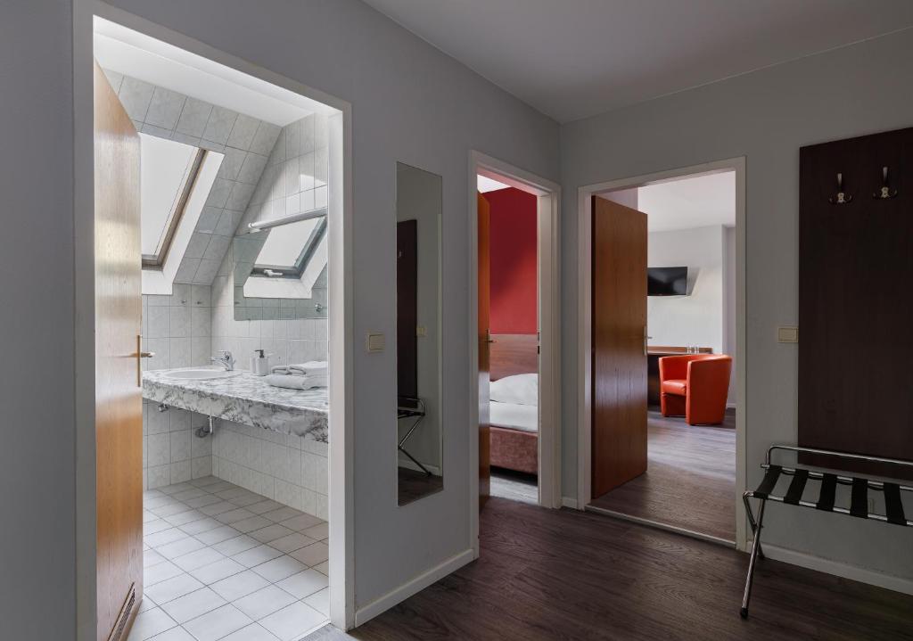 Kuchyň nebo kuchyňský kout v ubytování Hotel Nova