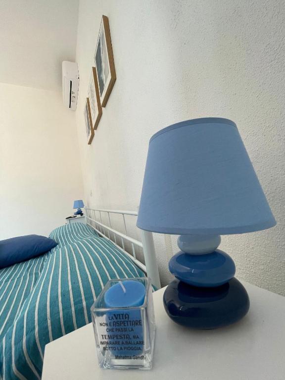 Postel nebo postele na pokoji v ubytování B&B Orizzonte Blu
