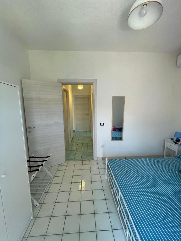 Postel nebo postele na pokoji v ubytování B&B Orizzonte Blu
